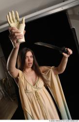 Woman Adult Average White Fighting with knife Standing poses Casual